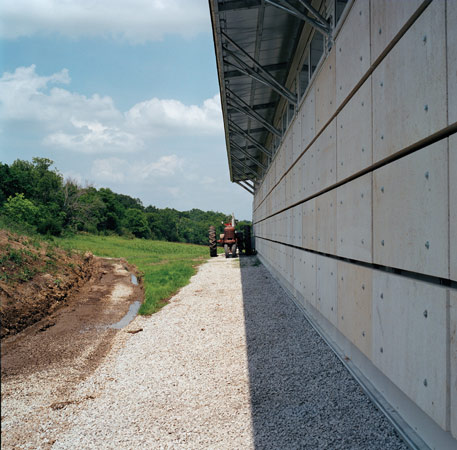 The north side is clad with two-inch slabs of finely machined Kansas limestone hung using a mortarless system. 'They can cut that stone just like sliced bread,' Rockhill says.